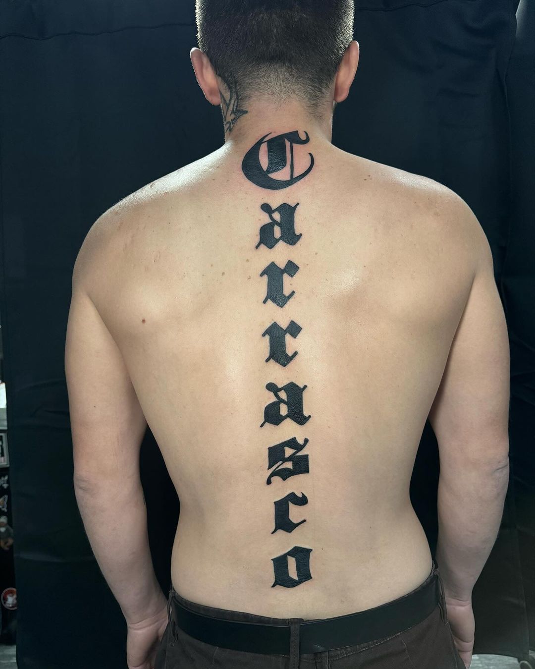 sixer-tattoo-carasco-spine-script